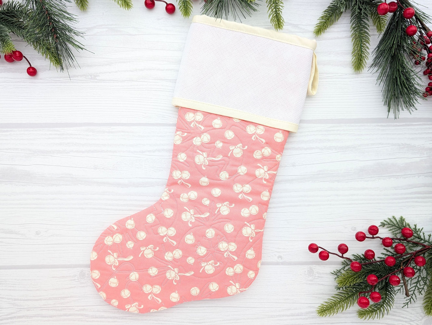pink bells quilted Christmas stocking with blank cross stitch Aida cuff