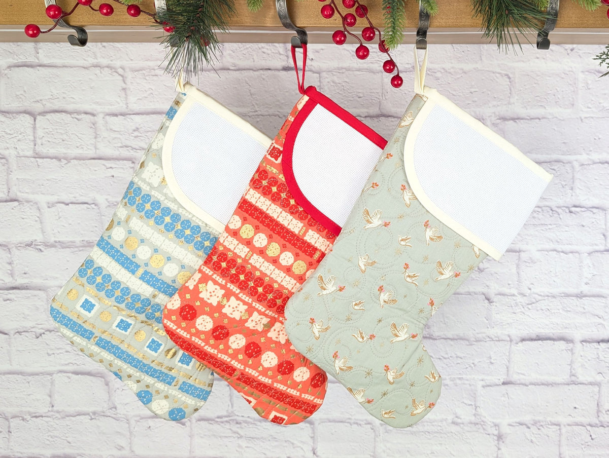 quilted christmas stocking with blank cross-stitchable cuff