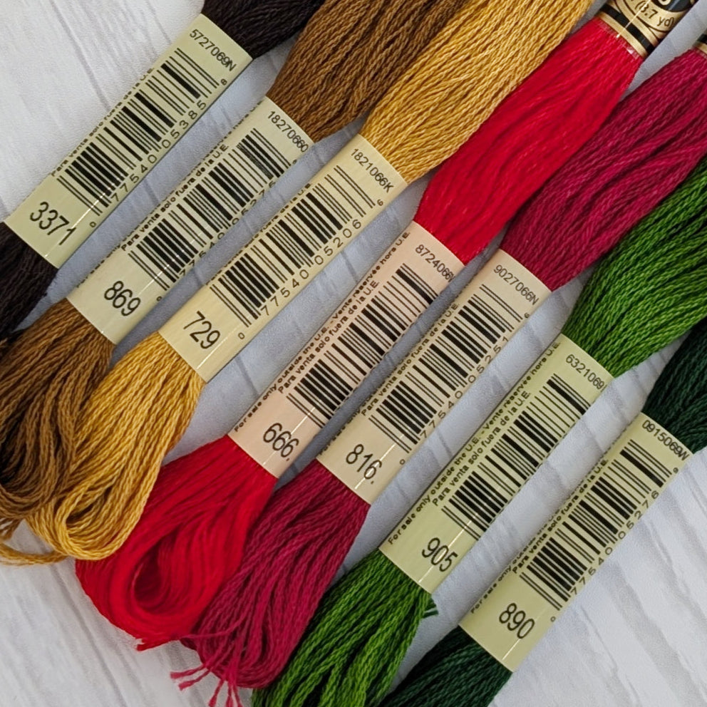 DMC embroidery floss bundle featuring warm holiday colors