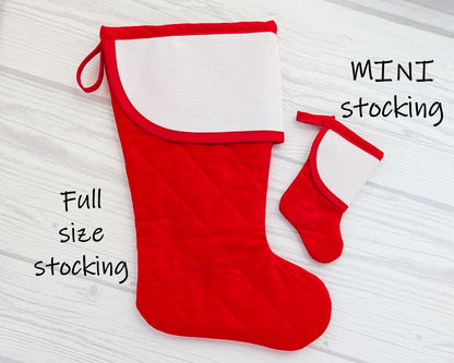 mini christmas stocking with blank cross-stitchable cuff next to full size stocking
