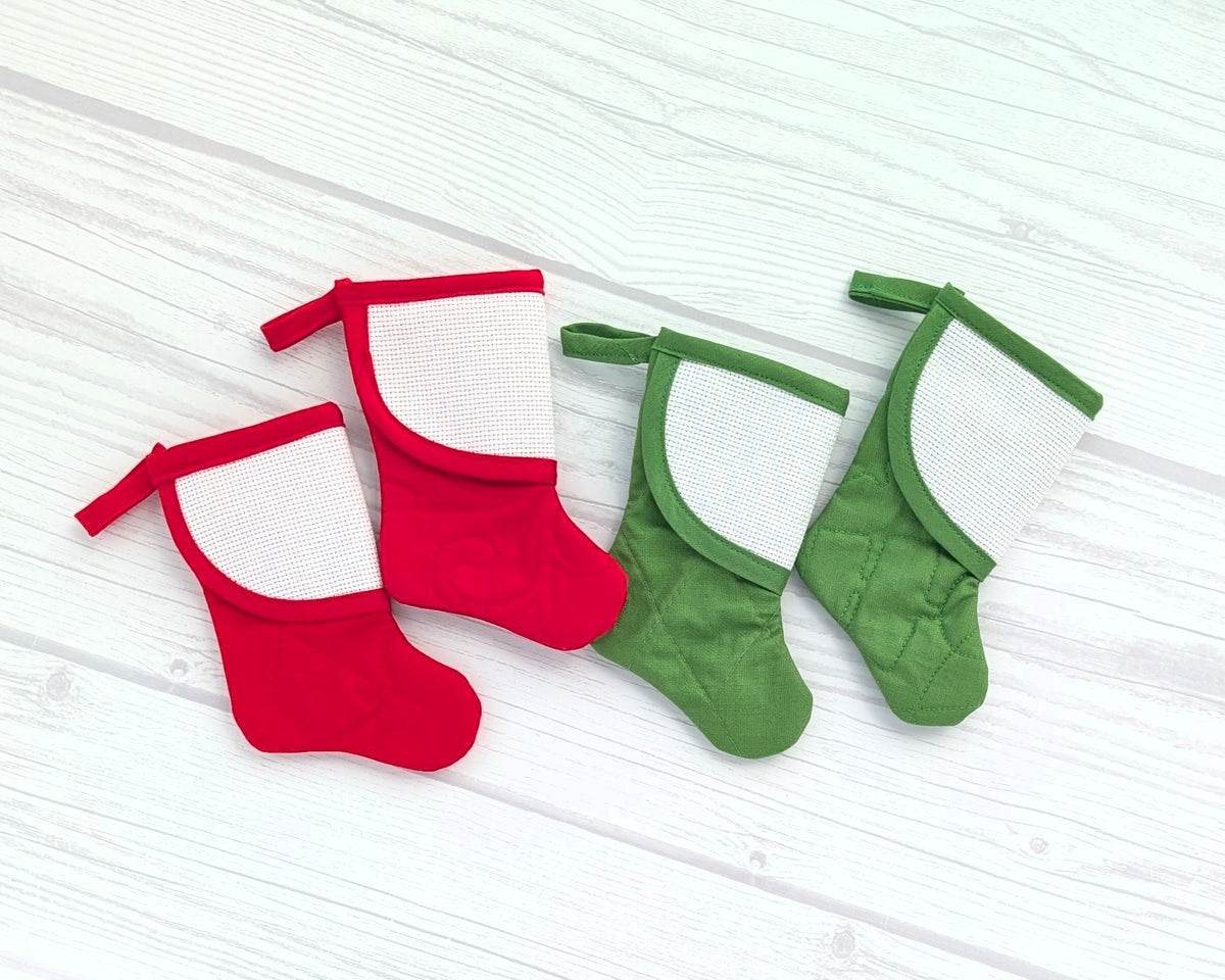red and green mini stockings with blank cross-stitchable cuffs