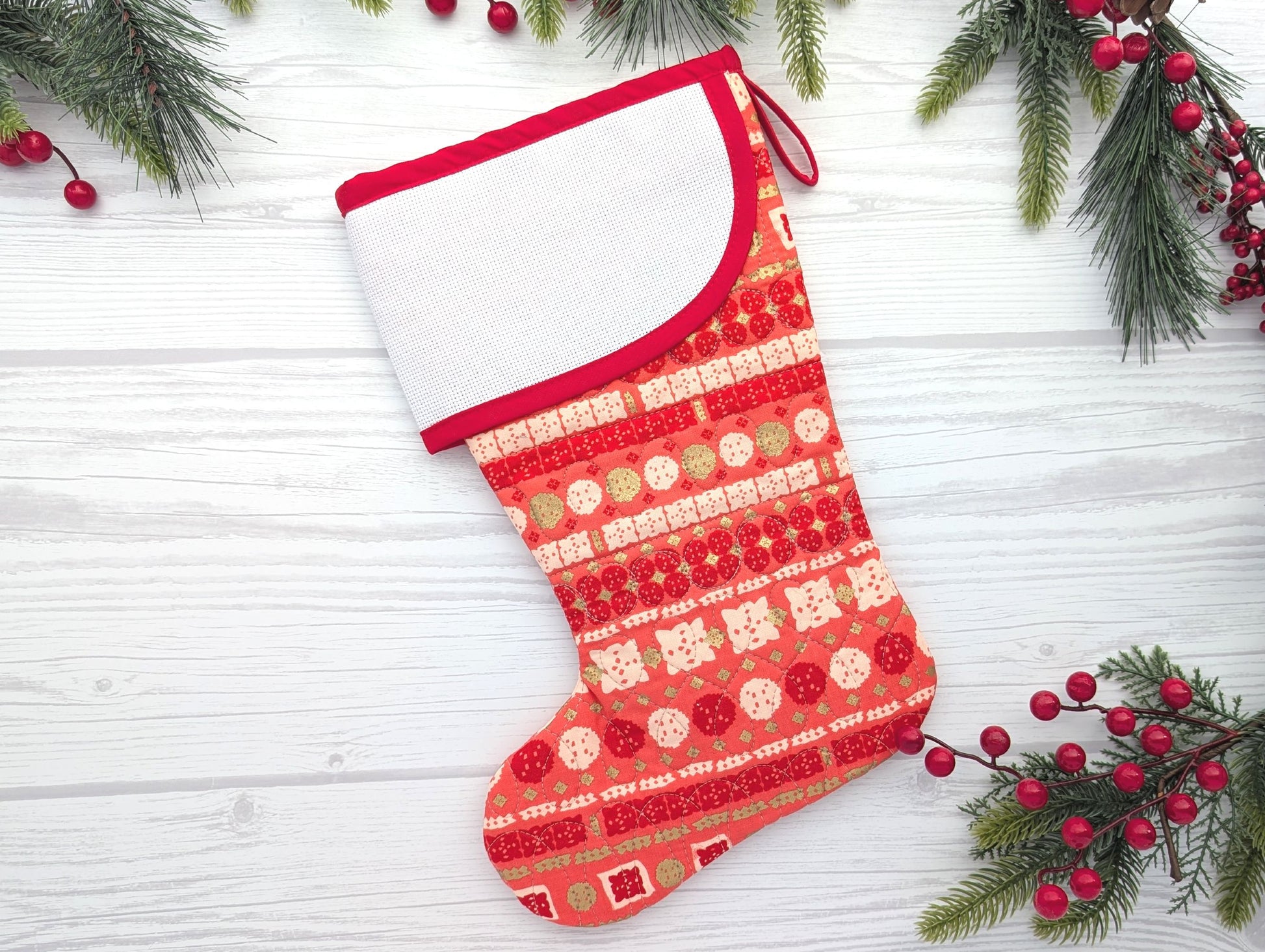 Red boho stripe quilted christmas stocking with blank cross-stitchable cuff