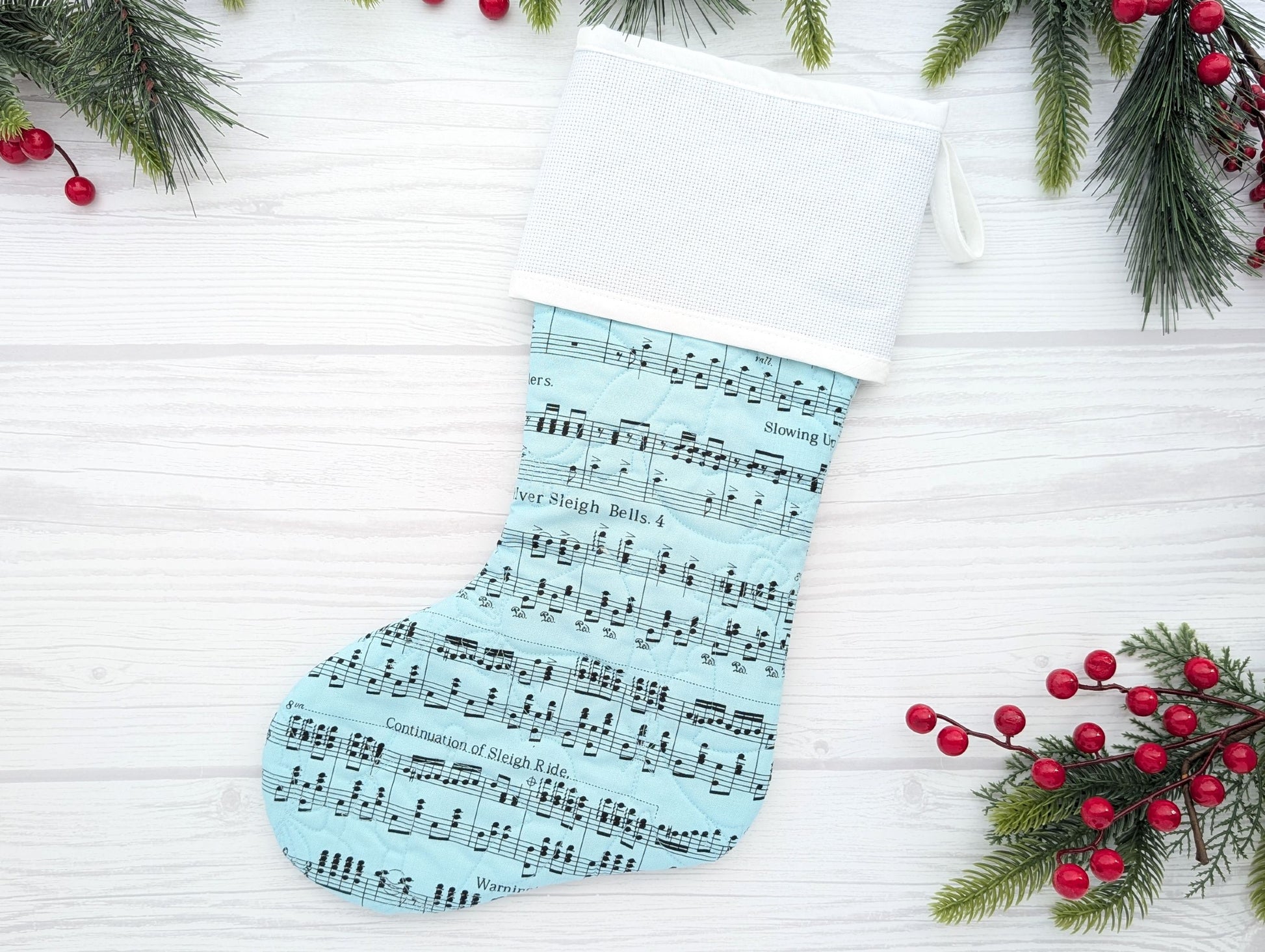 aqua blue music quilted Christmas stocking with blank cross stitch Aida cuff