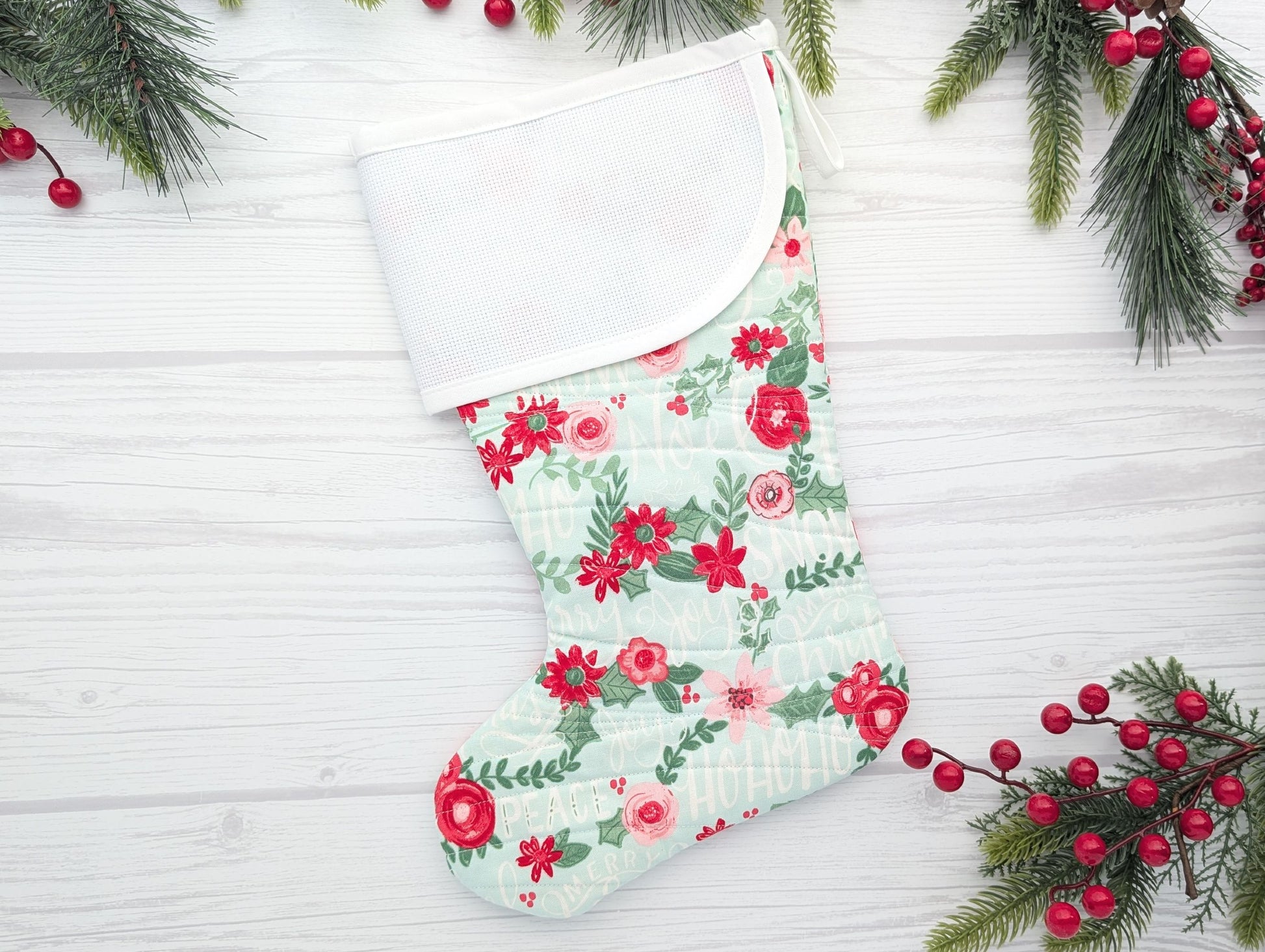 aqua floral quilted christmas stocking with blank cross stitchable aida cuff