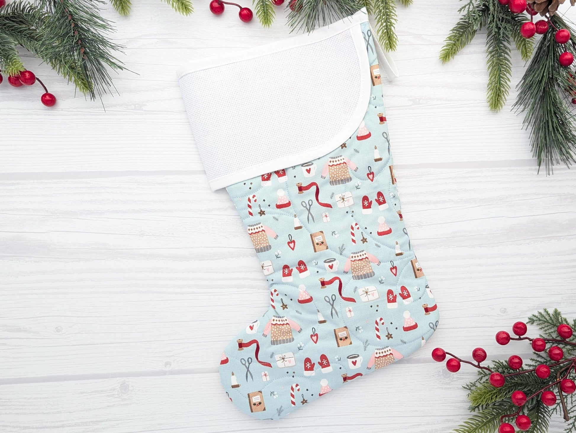 aqua winter quilted Christmas stocking with blank cross stitch cuff