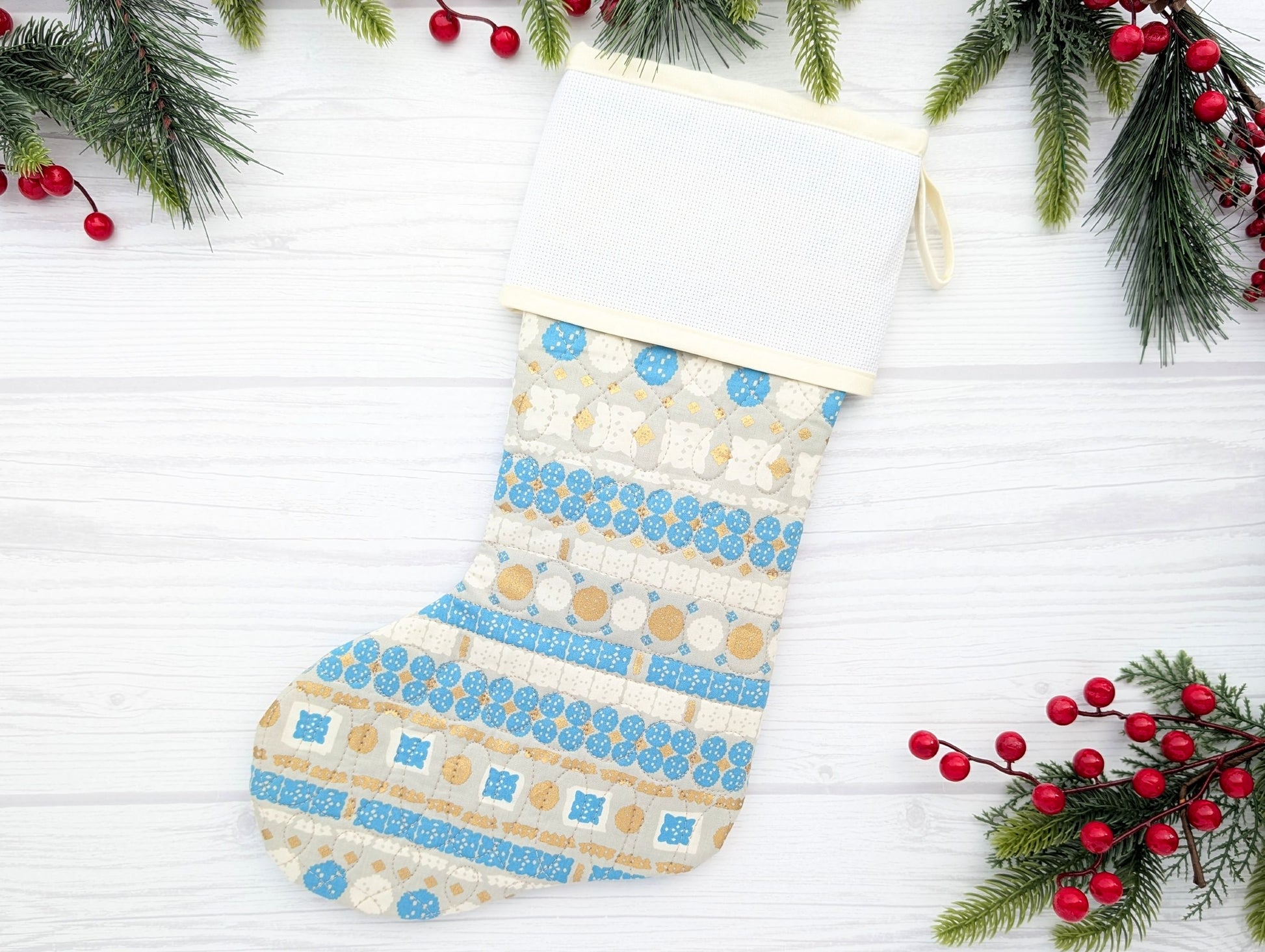 blue stripe bohoquilted Christmas stocking with blank cross stitch Aida cuff