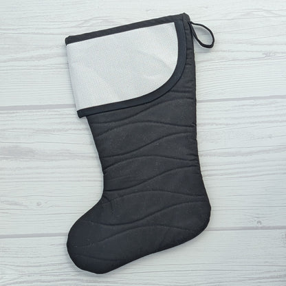 black Christmas stocking with blank cross stitch cuff