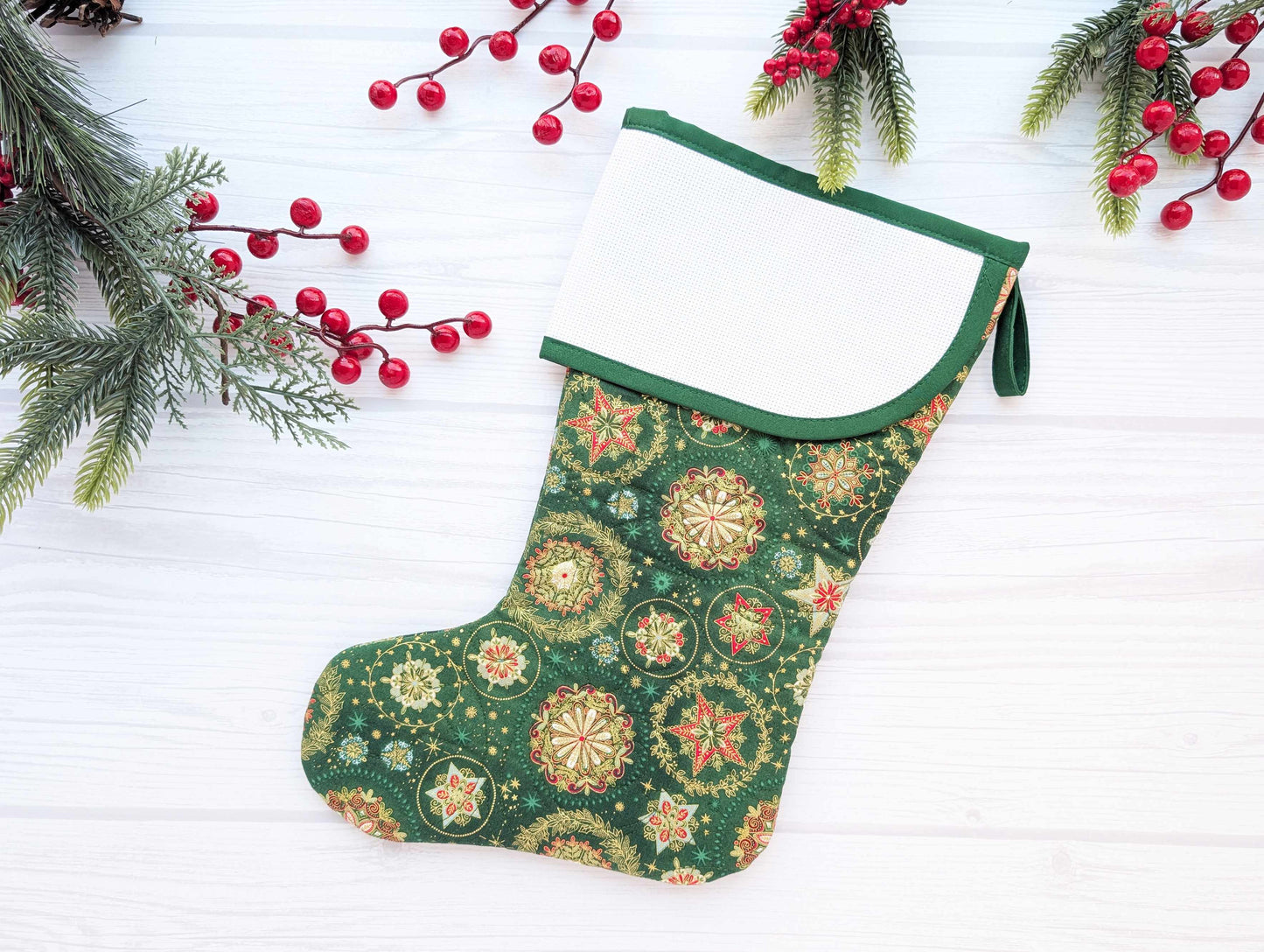 green snowflakes quilted christmas stocking with blank cross stitch aida cuff