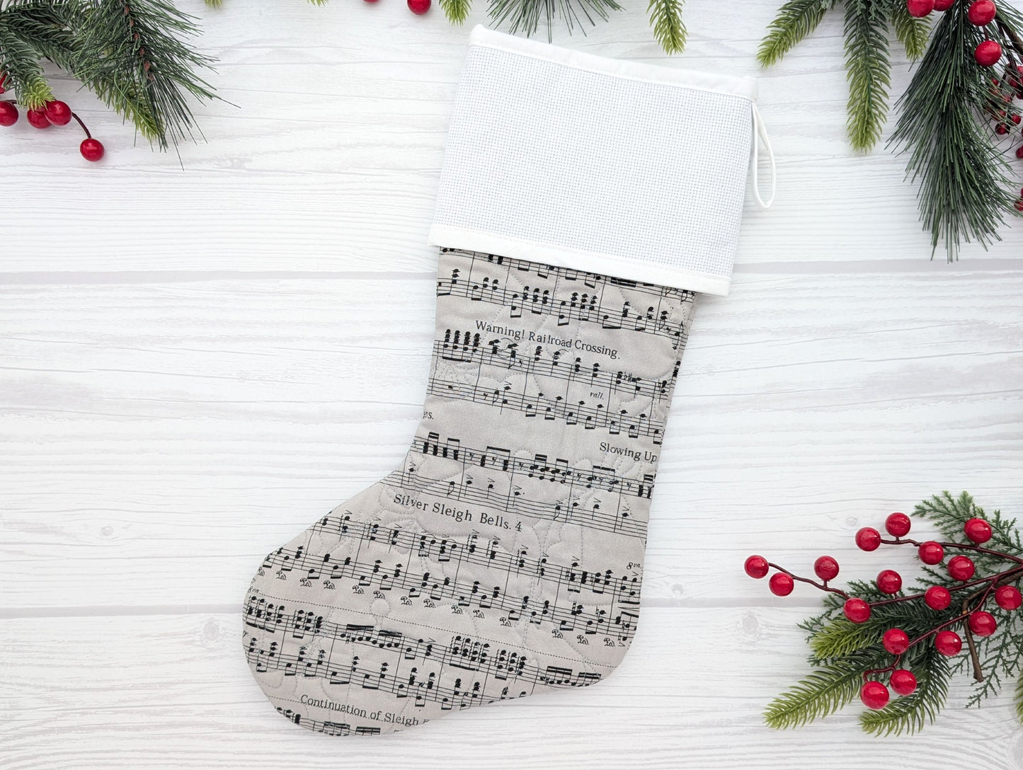 gray music quilted Christmas stocking with blank cross stitch Aida cuff