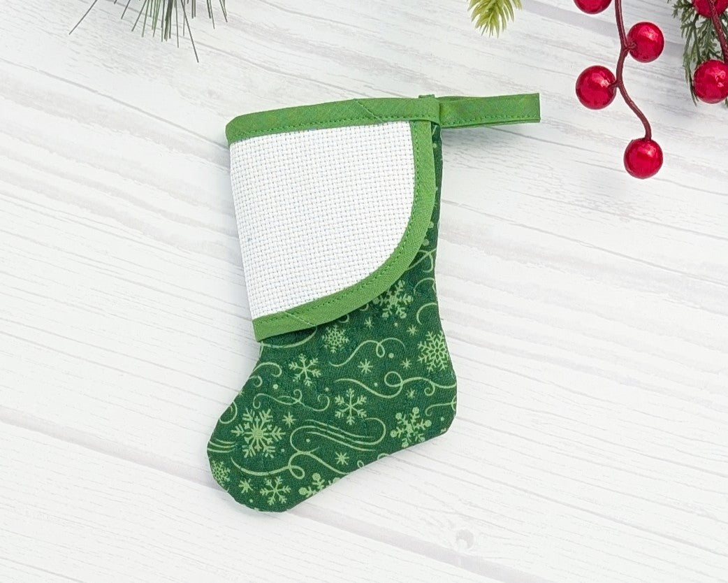 green snowflakes mini christmas stocking with blank cross-stitchable cuff