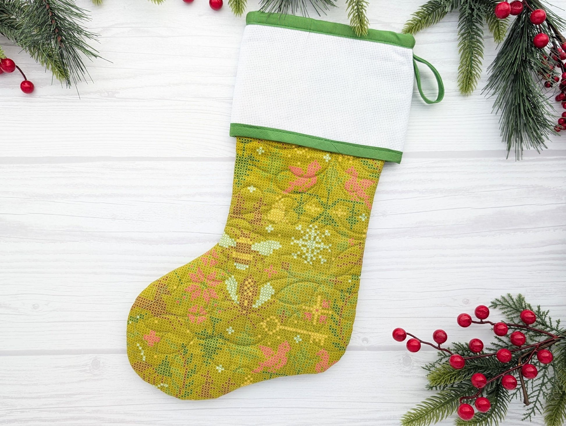 green quilted Christmas stocking with blank cross stitch Aida cuff