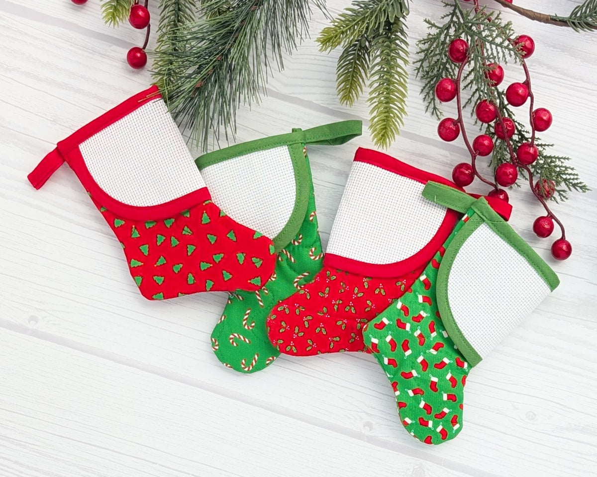 red or green mini christmas stocking with blank cross-stitchable cuff