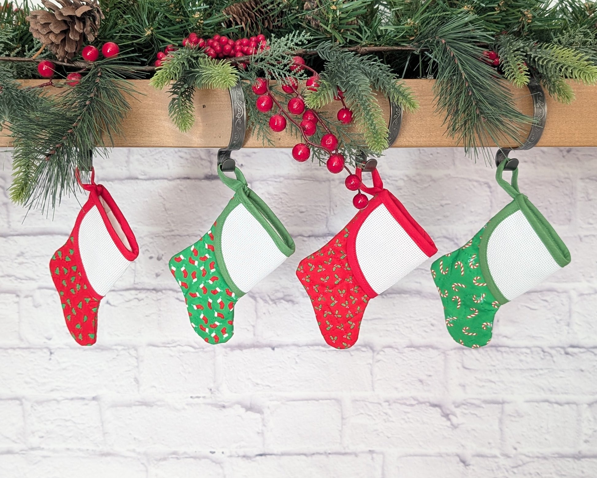 red or green mini christmas stocking with blank cross-stitchable cuff
