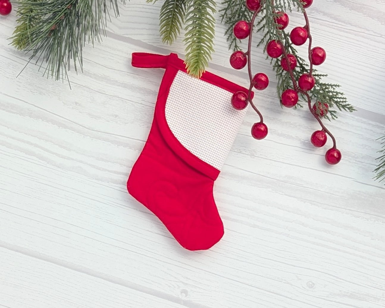 red curly quilting mini christmas stocking with blank cross-stitchable cuff