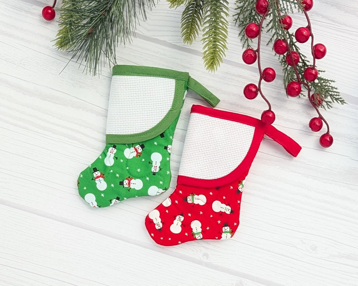 red or green snowmenmini christmas stocking with blank cross-stitchable cuff