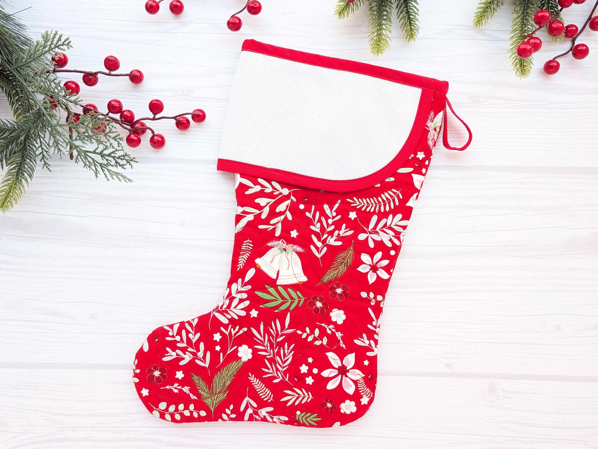 red floral holly bells quilted christmas stocking with blank cross stitch aida cuff