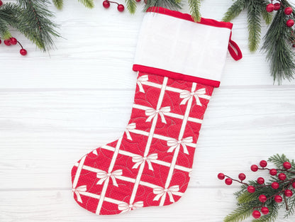 red bows quilted Christmas stocking with blank cross stitch Aida cuff