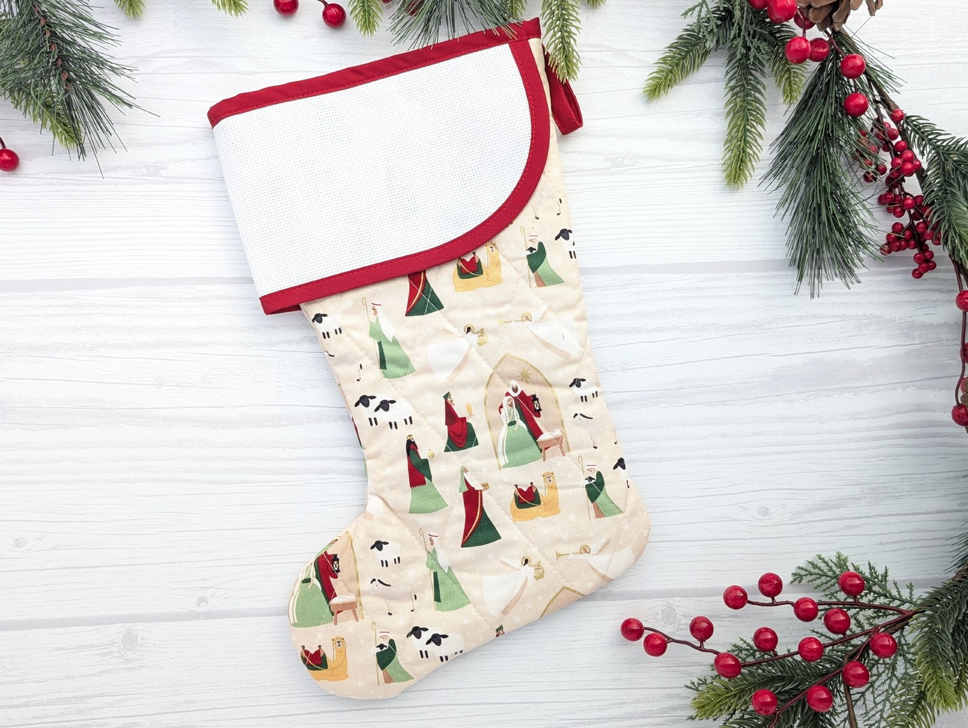 red nativity Christmas stocking with blank aida cuff
