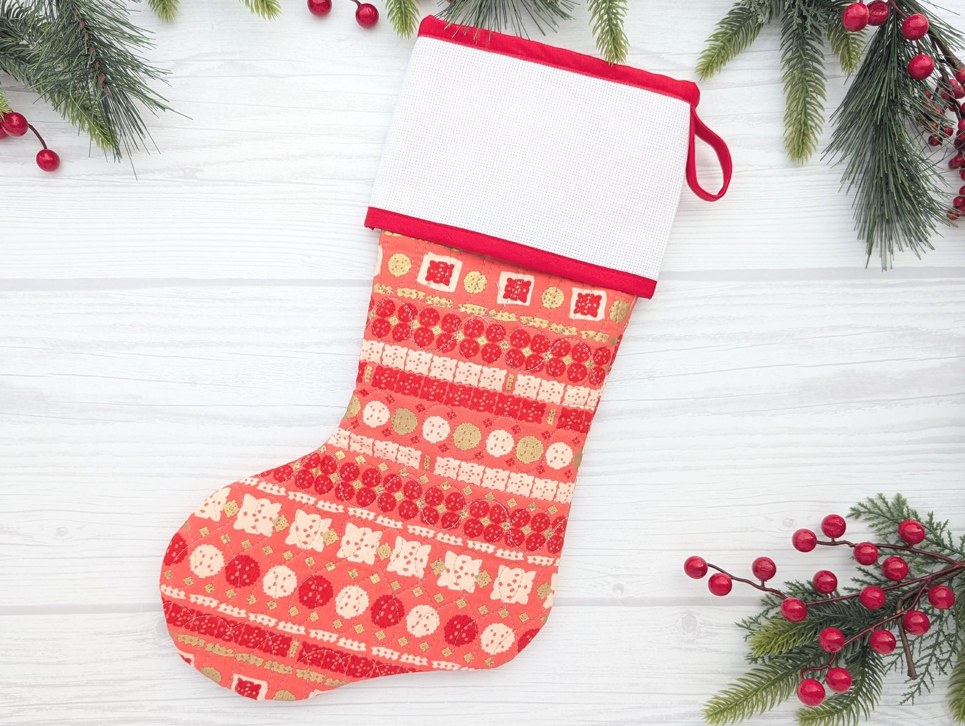 red stripe quilted Christmas stocking with blank cross stitch Aida cuff