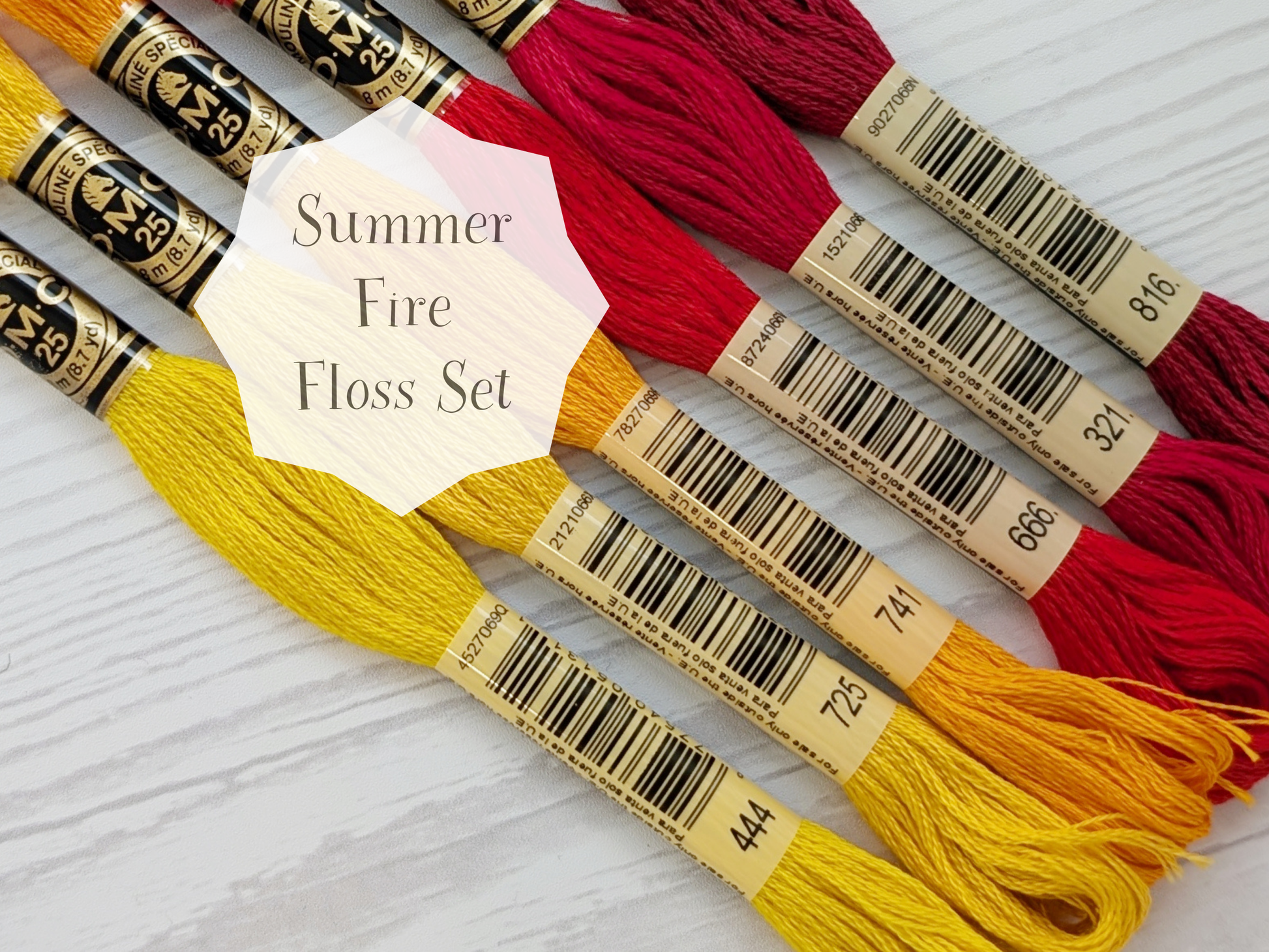 dmc embroidery floss bundle featuring reds, yellows, and oranges