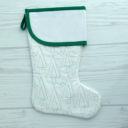 White Christmas stocking with green trim and blank cross stitch cuff