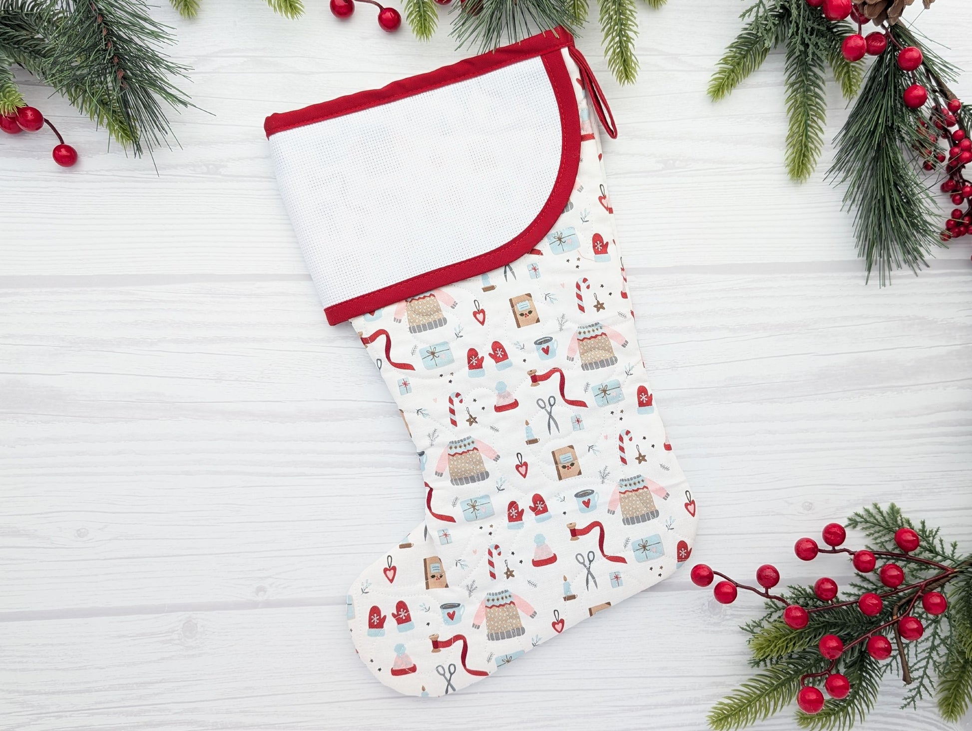 white winter quilted Christmas stocking with blank cross stitch cuff